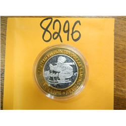 .999 Fine silver casino $10 token/strike ASW= .60 oz.