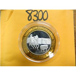 .999 Fine silver casino $10 token/strike ASW= .60 oz.