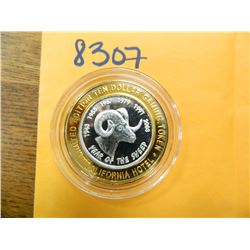 .999 Fine silver casino $10 token/strike ASW= .60 oz.