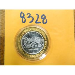 .999 Fine silver casino $10 token/strike ASW= .60 oz.