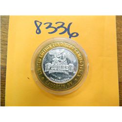 .999 Fine silver casino $10 token/strike ASW= .60 oz.