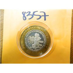.999 Fine silver casino $10 token/strike ASW= .60 oz.