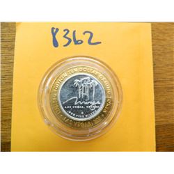 .999 Fine silver casino $10 token/strike ASW= .60 oz.