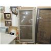 Image 1 : BRAND NEW STORM DOOR AND HARDWARE $600