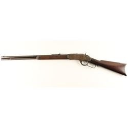 Winchester 1873 lever action rifle, .38 caliber,  24” barrel, full magazine, walnut stocks, old blue