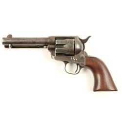 Colt SAA revolver, .45 caliber, 4.75” barrel, S/N  121807, blued and case hardened finish, wood grip