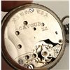 Image 2 : Small ornate cast metal open face ladies lapel  watch, approximately 1.25” in diameter marked on  th