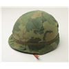 Image 2 : U.S. Vietnam-era helmet with liner and camo cover  in overall very good condition.       Est.:   $75