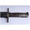 Image 2 : Swiss saw tooth bayonet and metal sheath in  overall very good condition.    Est.:  $75-$150.