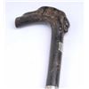 Image 2 : Carved reclining dog in dark horn as grip to  antique cane with concealed dagger. Est.:  $200-$400