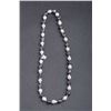 Image 1 : One unique collection of black and white baroque  pearls 15-12mm in a 30 inches strand Est:$500-600
