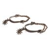 Image 2 : Unmarked iron spurs with 1-1/2” 10 point rowels  and heel chains; heavy dark patina.    Est.:   $300