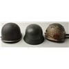 Image 3 : Lot of 3 military helmets including a good  reproduction of an SS helmet, possibly a movie  prop; a 