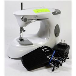 DRESS MAKER SEWING MACHINE