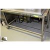 Image 1 : STAINLESS STEEL TABLE WITH WHEELS