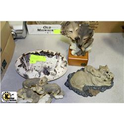 COLLECTION OF FOUR DECORATIVE WOLF ORNAMENTS