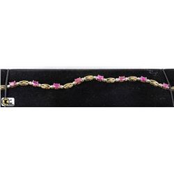 10K YELLOW GOLD RUBY(3.25CT) BRACELET - 7"