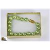 Image 1 : #10-LIGHT GREEN SEASHELL PEARL BRACELET