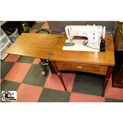 SINGER SEWING MACHINE WITH LIGHT TABLE