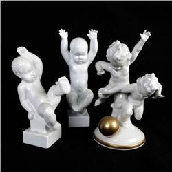 Three Ceramic Cherub Figures