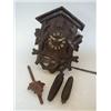 Image 1 : A CUCKOO CLOCK, 20TH CENTURY (pendulum and two pine weights)  15-20...