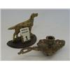 Image 1 : AN ART NOUVEAU BRASS CHAMBER CANDLESTICK, and a desk calender with brass dog (2)  20-30...