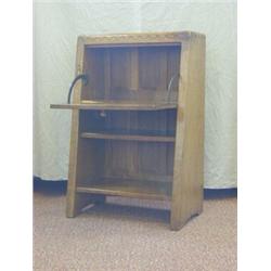 ROBERT 'MOUSEMAN' THOMPSON, an oak child's desk, arched frieze, fall-front with iron hinges over...