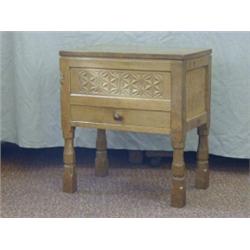 ROBERT 'MOUSEMAN' THOMPSON, an oak work box, plank top, star carved frieze, over a single fitted...