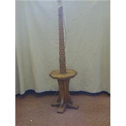 ROBERT 'MOUSEMAN' THOMPSON, an oak freestanding lamp, lozenge carved column, dished octagonal tie...
