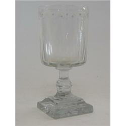 A CLEAR GLASS GOBLET, mid 19th century, drape cut rim, double stem, square star cut base, height...
