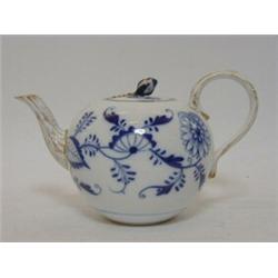 A MEISSEN GLOBULAR TEAPOT, late 19th Century, underglaze blue Onion pattern, gilt detailing, cros...