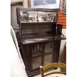 NEW MAHOGANY BAR CABINET - MIRRORED TOP AND SWIVEL STORAGE IN BASE - ONE MIRROR INSIDE AS-IS