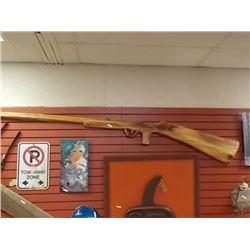 CHAINSAW CARVING - REALLY LARGE RIFLE - ~9' LONG