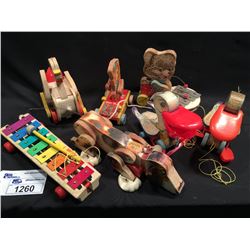 COLLECTION OF 1950'S FISHER PRICE WOODEN PULL TOYS INC.: PELICANS, BEAR, CHICKENS, DOG