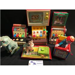 COLLECTION OF ASSORTED VINTAGE TOYS INC: 3 SLOT MACHINES, TOY T.V., RABBIT, CLOWN JACK IN THE BOX,