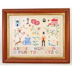 C. 1960S ALPHABET CROSS STITCH SAMPLER - FRAMED