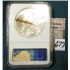 Image 2 : 1922 P U.S. Peace Silver Dollar. Holder damaged, but NGC slabbed MS 63. Has a nice light original to