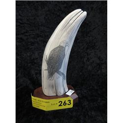 Resin scrimshaw sculpture on wood base