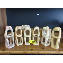 9 Carved stone sculptures