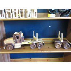 Wood logging truck with trailer
