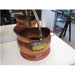 Copper pot with brass handle