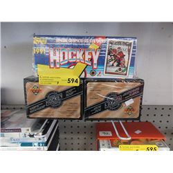 3 Factory sealed boxes of hockey trading cards