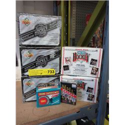 7 Boxes of new sports trading cards