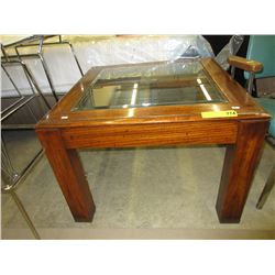 Glass top end table - used