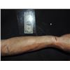 Image 2 : SEVERED ARMATURED SILICONE ARM WITH TATTOO AND CUTS