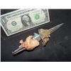 Image 2 : CHILD'S PLAY 2 SCREEN USED KNIFE FROM CHUCKY'S ARM WITH FLESH SHIRT SWATCH AND TAPE STILL ATTATCHED