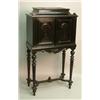 Image 1 : A 19th Century French ebonised collectors cabinet, with box compartment and 2 doors enclosing 5 t...