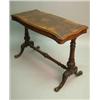 Image 1 : A Victorian walnut stretcher table, with quarter veneered top, on reeded end supports, fluted str...