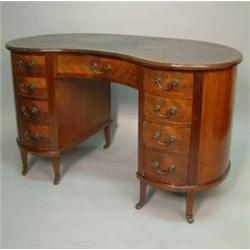 A 1920 S Mahogany Kidney Shape Desk With Green Leather Skiver