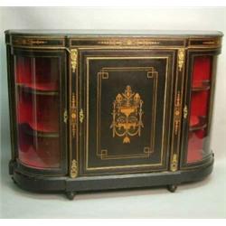 A Victorian inlaid ebonised credenza, with central panelled door decorated with an urn and anthem...
